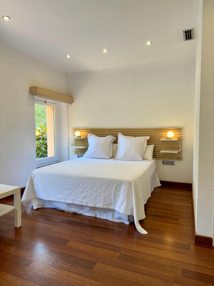 Cama o camas de una habitación en Hotel Spa La Central - Adults Only