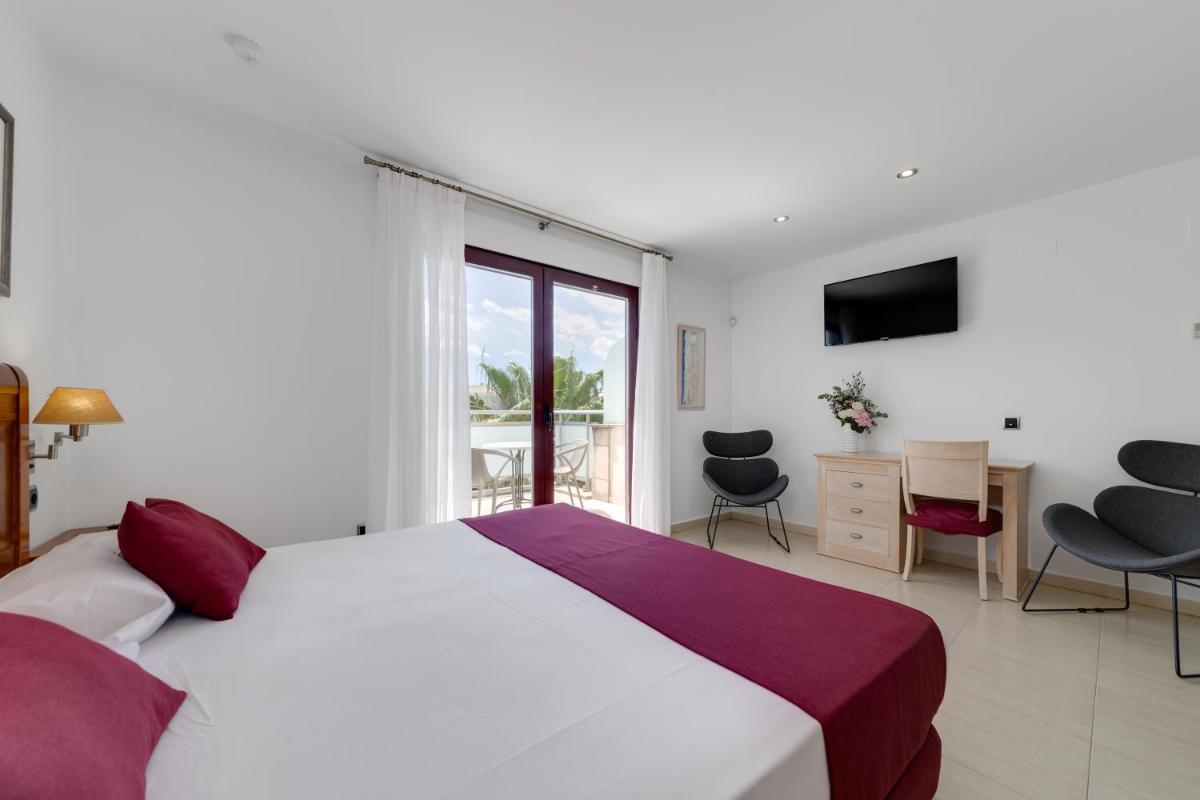 Cama o camas de una habitación en Daniya Denia Spa & Business 4*