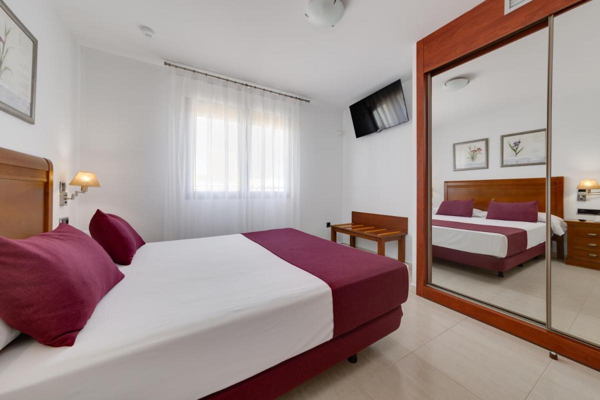 Cama o camas de una habitación en Daniya Denia Spa & Business 4*