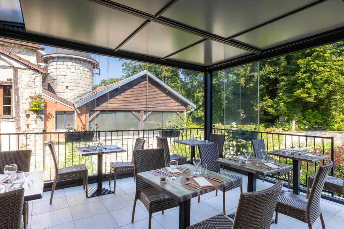 Jardin de l'établissement Le Moulin Du Landion Hôtel et Spa