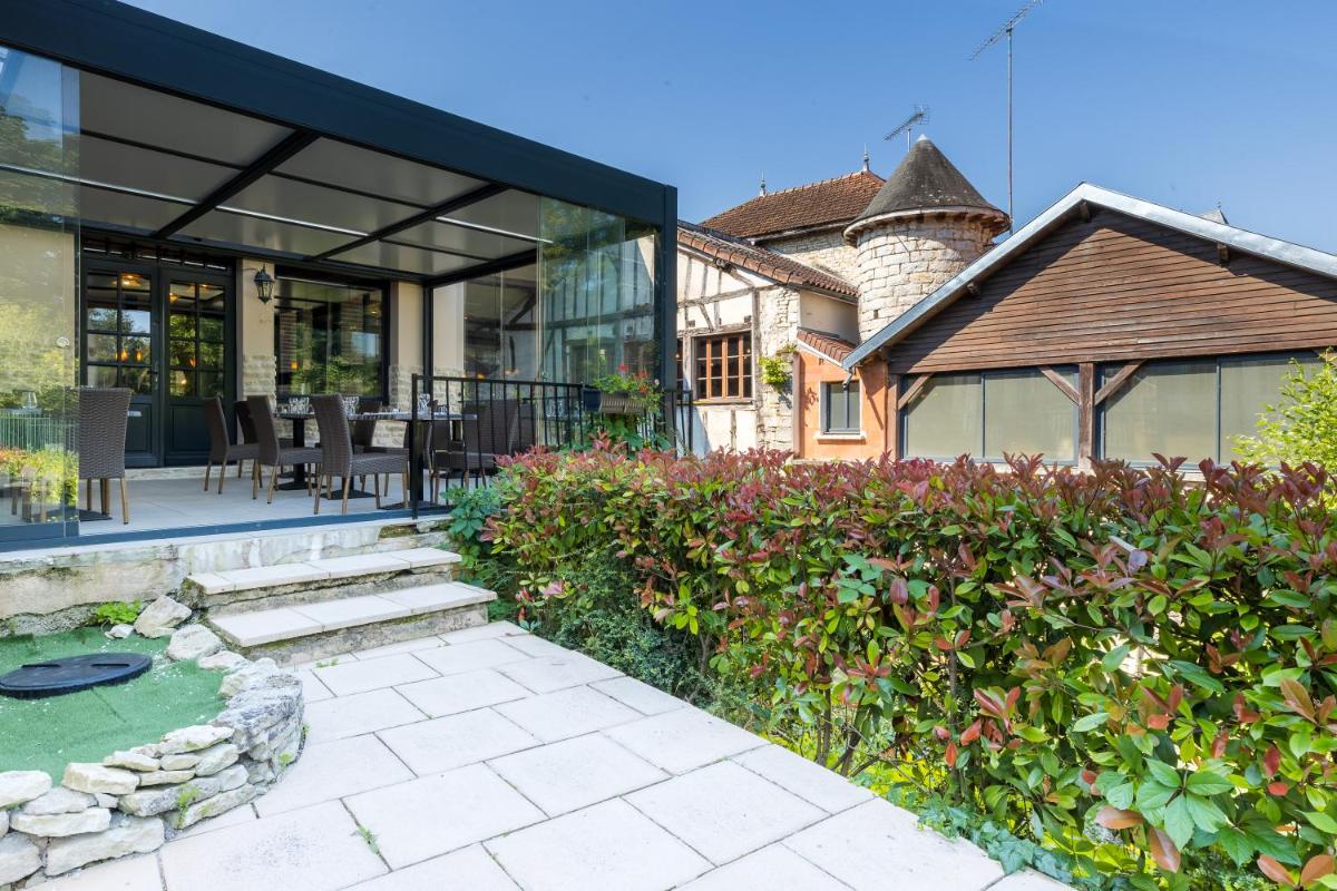 Jardin de l'établissement Le Moulin Du Landion Hôtel et Spa
