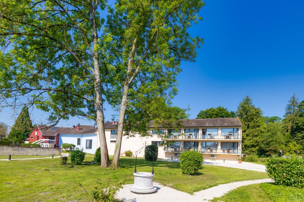 Jardin de l'établissement Le Moulin Du Landion Hôtel et Spa