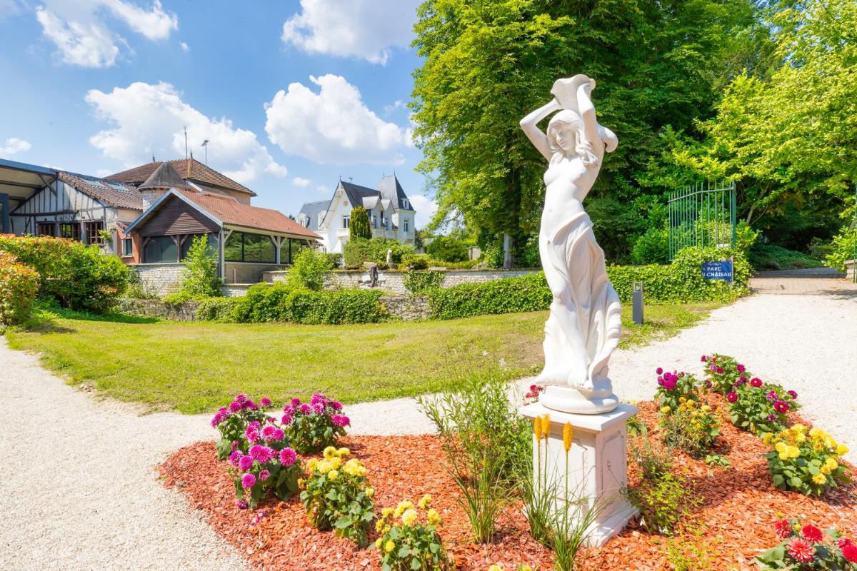 Jardin de l'établissement Le Moulin Du Landion Hôtel et Spa