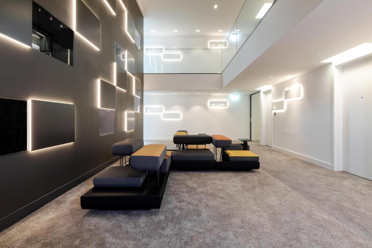 TV/Unterhaltungsangebot in der Unterkunft KPM Hotel & Residences Berlin, a Member of Design Hotels TV/Unterhaltungsangebot in der Unterkunft KPM Hotel & Residences Berlin, a Member of Design Hotels