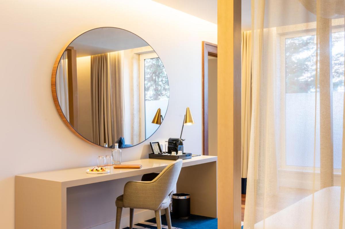 Uma cama ou camas num quarto em Palácio do Governador - Lisbon Hotel & Spa