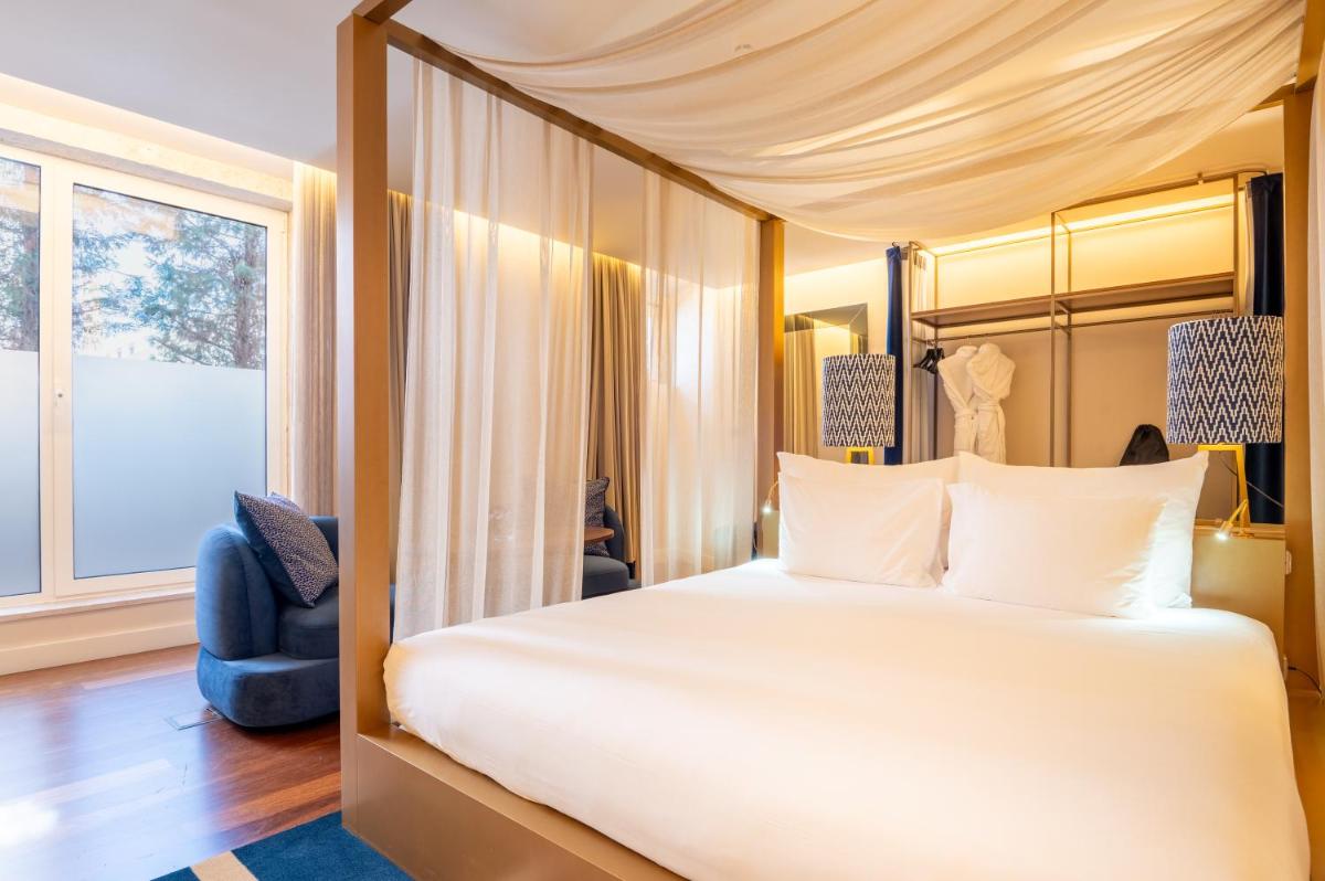 Uma cama ou camas num quarto em Palácio do Governador - Lisbon Hotel & Spa