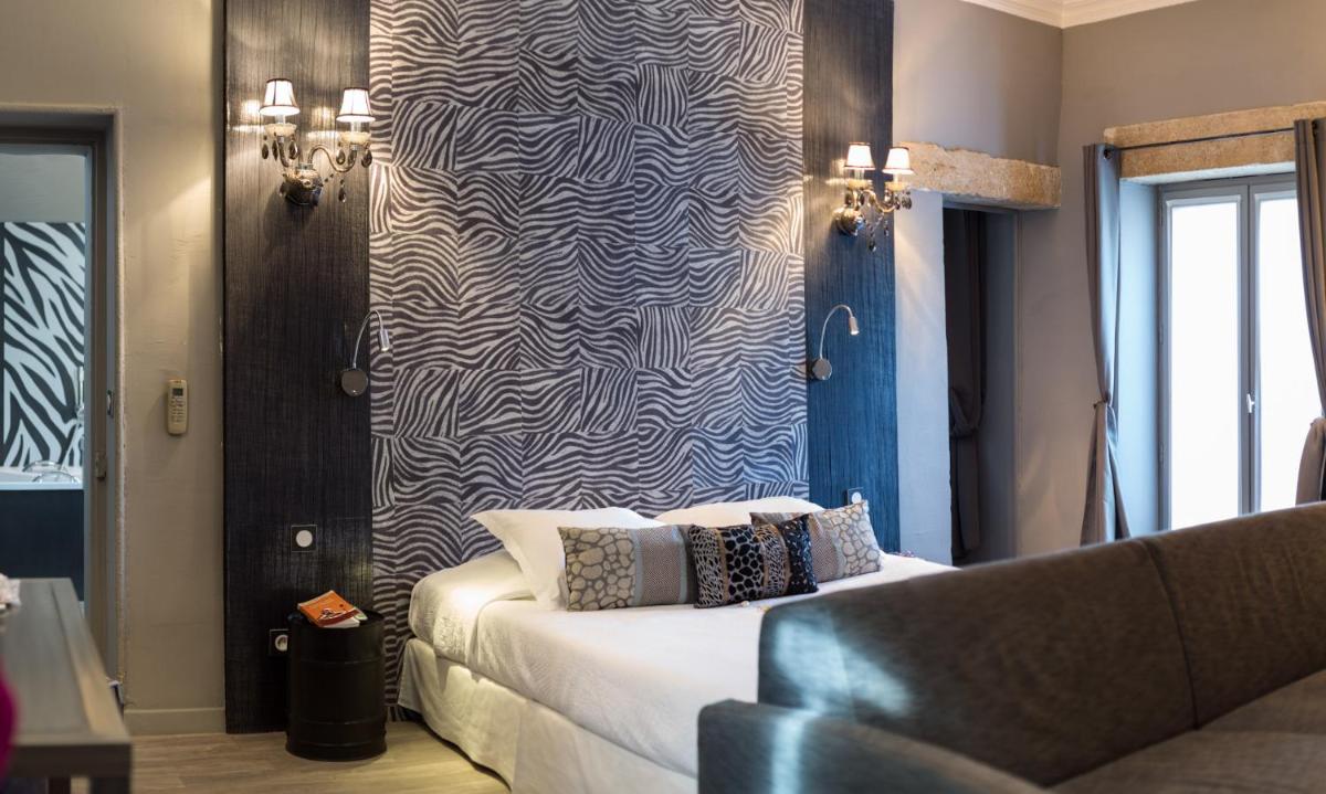 Un ou plusieurs lits dans un hébergement de l'établissement Le Castellas Hotel & SPA - TERITORIA