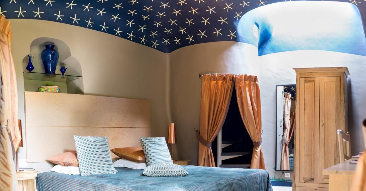 Un ou plusieurs lits dans un hébergement de l'établissement Le Castellas Hotel & SPA - TERITORIA
