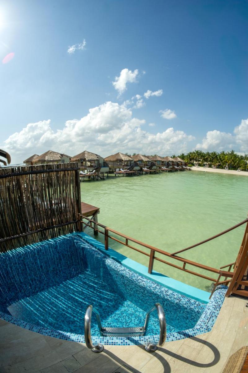 Palafitos Overwater Bungalows Catamarán, Cenote & More Inclusive - Housity
