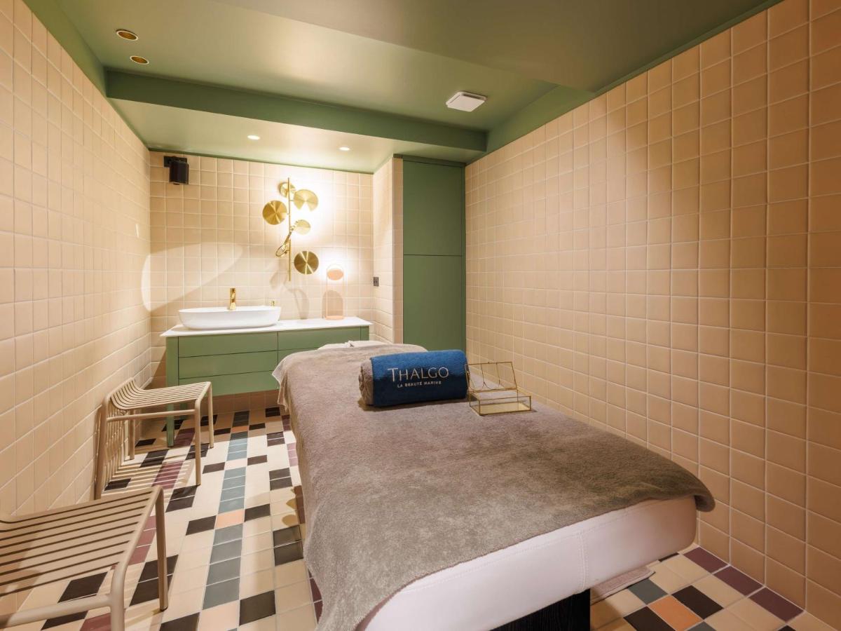 Un ou plusieurs lits dans un hébergement de l'établissement Aiden by Best Western Clermont-Ferrand Hotel & Spa