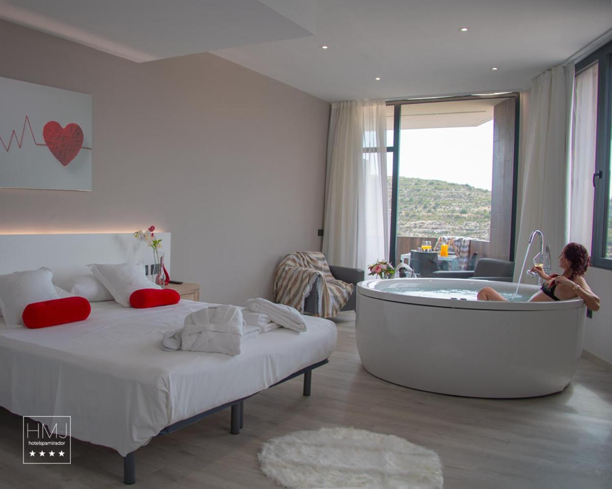Cama o camas de una habitación en Hotel Spa Mirador