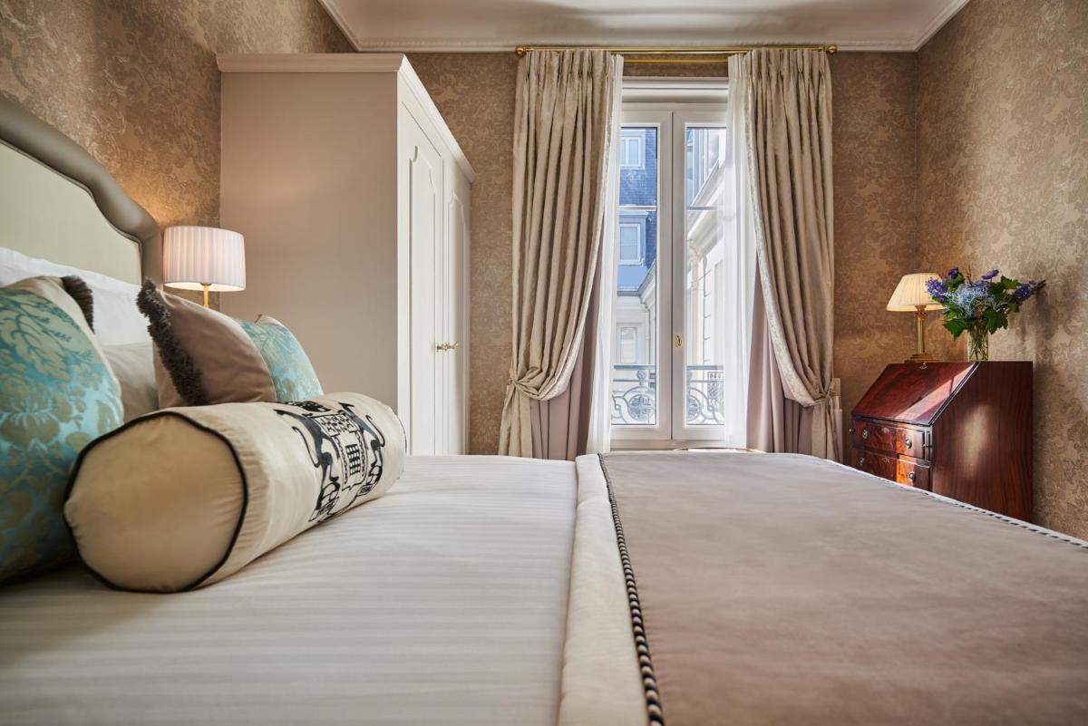 Un ou plusieurs lits dans un hébergement de l'établissement Hotel Westminster
