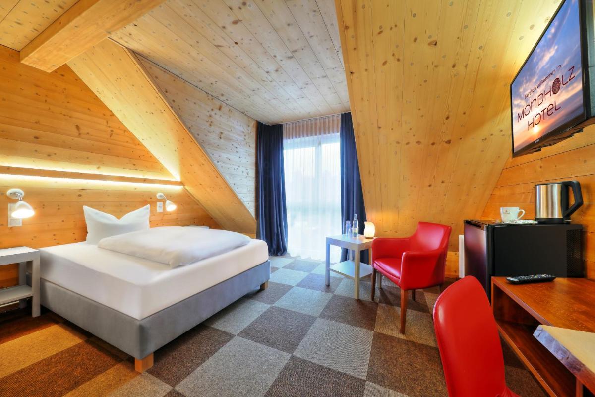 Hotel Müller Café & Wein - Mondholzhotel - Housity