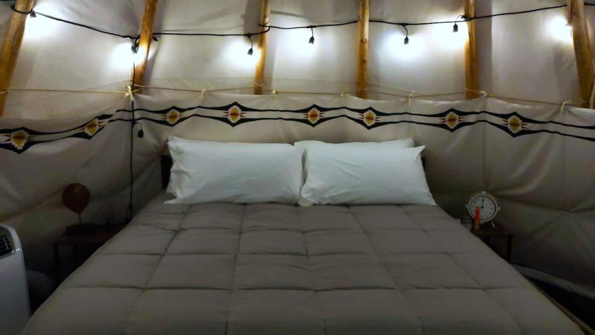 Wild Horses Luxury Tipi - Adjustable King Bed - Housity