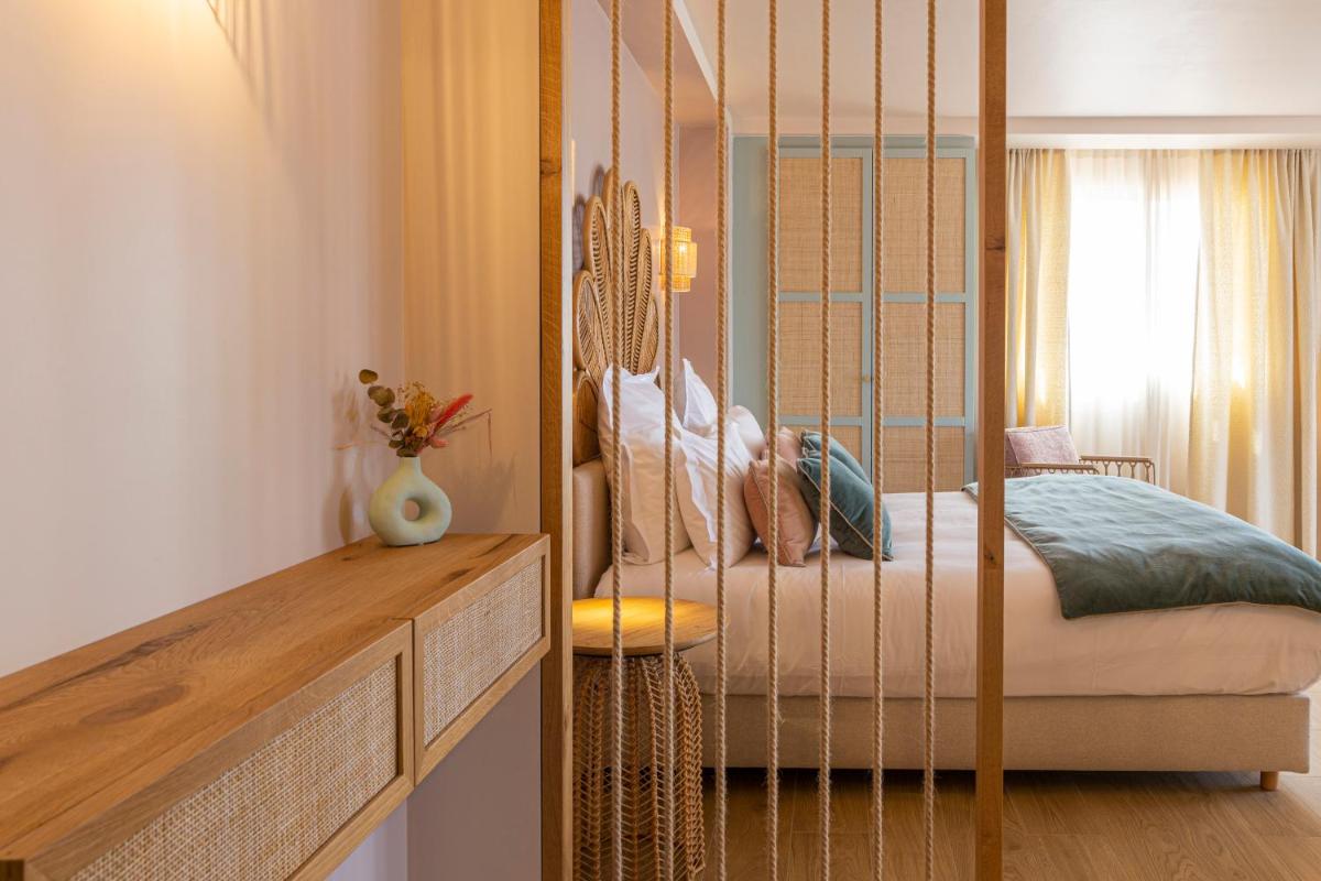 Un ou plusieurs lits dans un hébergement de l'établissement Hotel Riva Beach