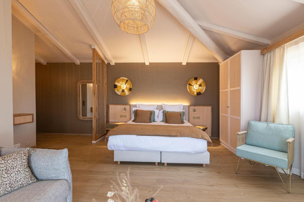 Un ou plusieurs lits dans un hébergement de l'établissement Hotel Riva Beach