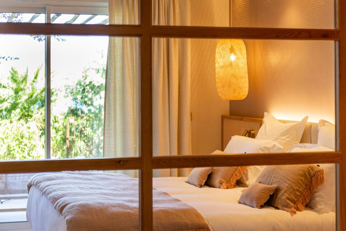 Un ou plusieurs lits dans un hébergement de l'établissement Hotel Riva Beach