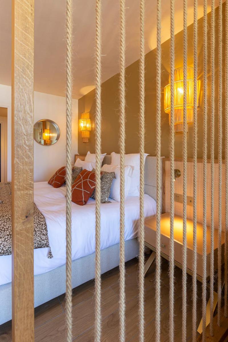 Un ou plusieurs lits dans un hébergement de l'établissement Hotel Riva Beach