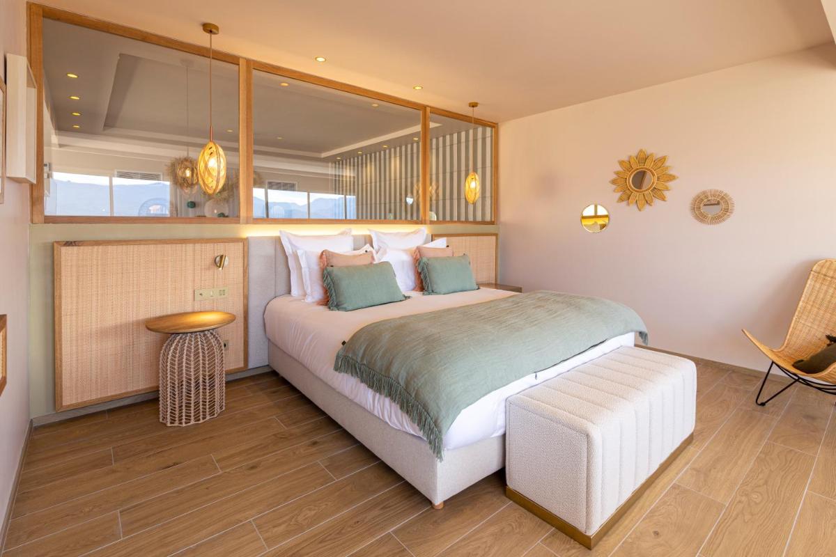 Un ou plusieurs lits dans un hébergement de l'établissement Hotel Riva Beach