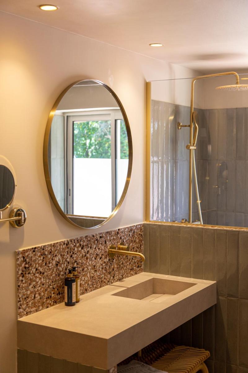 Salle de bains dans l'établissement Hotel Riva Beach