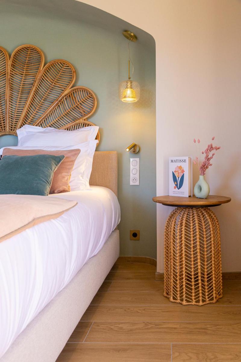 Un ou plusieurs lits dans un hébergement de l'établissement Hotel Riva Beach