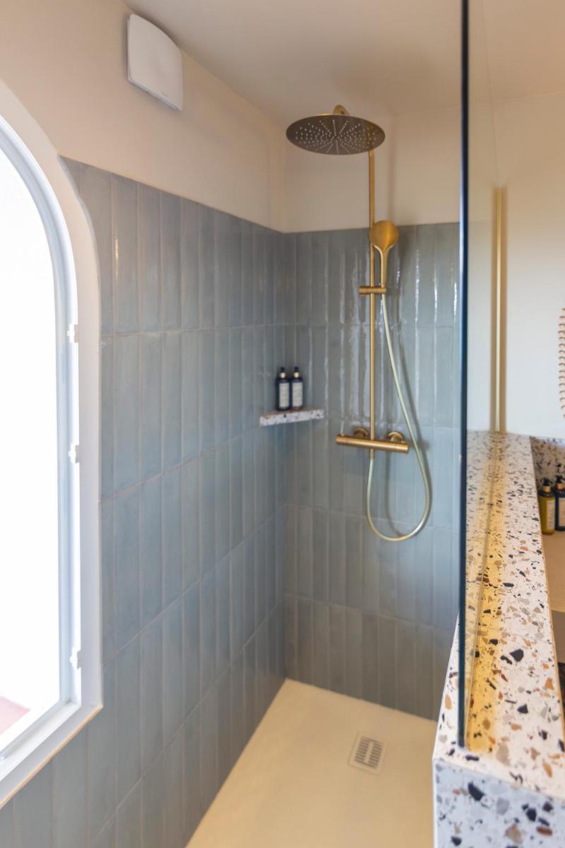 Salle de bains dans l'établissement Hotel Riva Beach