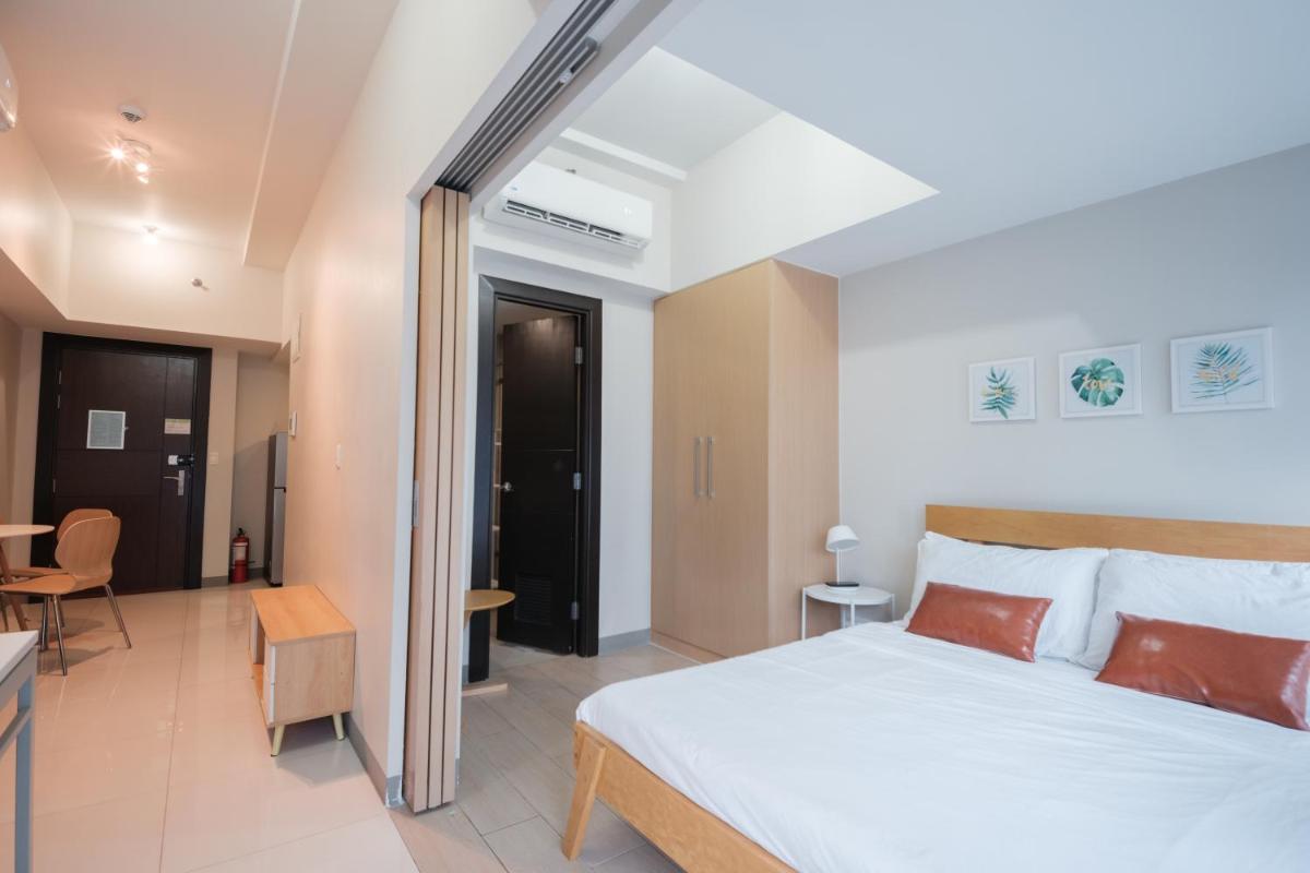 Uptown BGC Luxury 1br Suite with Fast Wifi - Housity