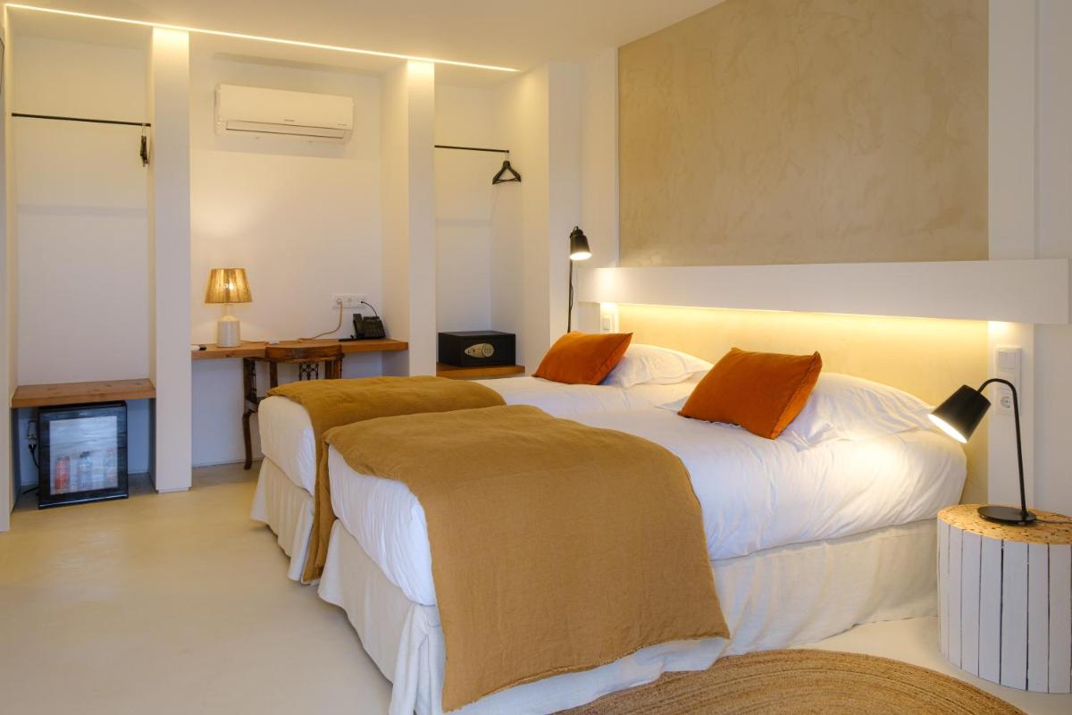 Uma cama ou camas num quarto em Sorraia Hotel Rural