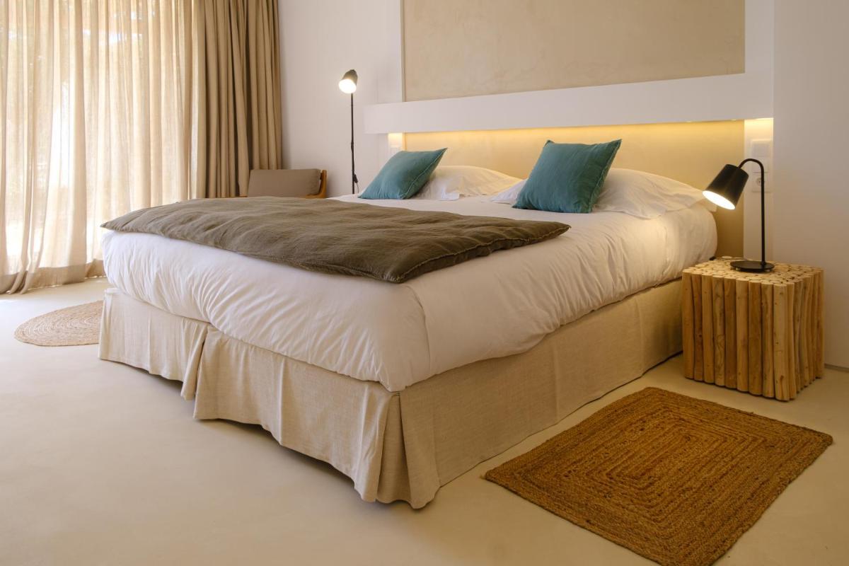 Uma cama ou camas num quarto em Sorraia Hotel Rural