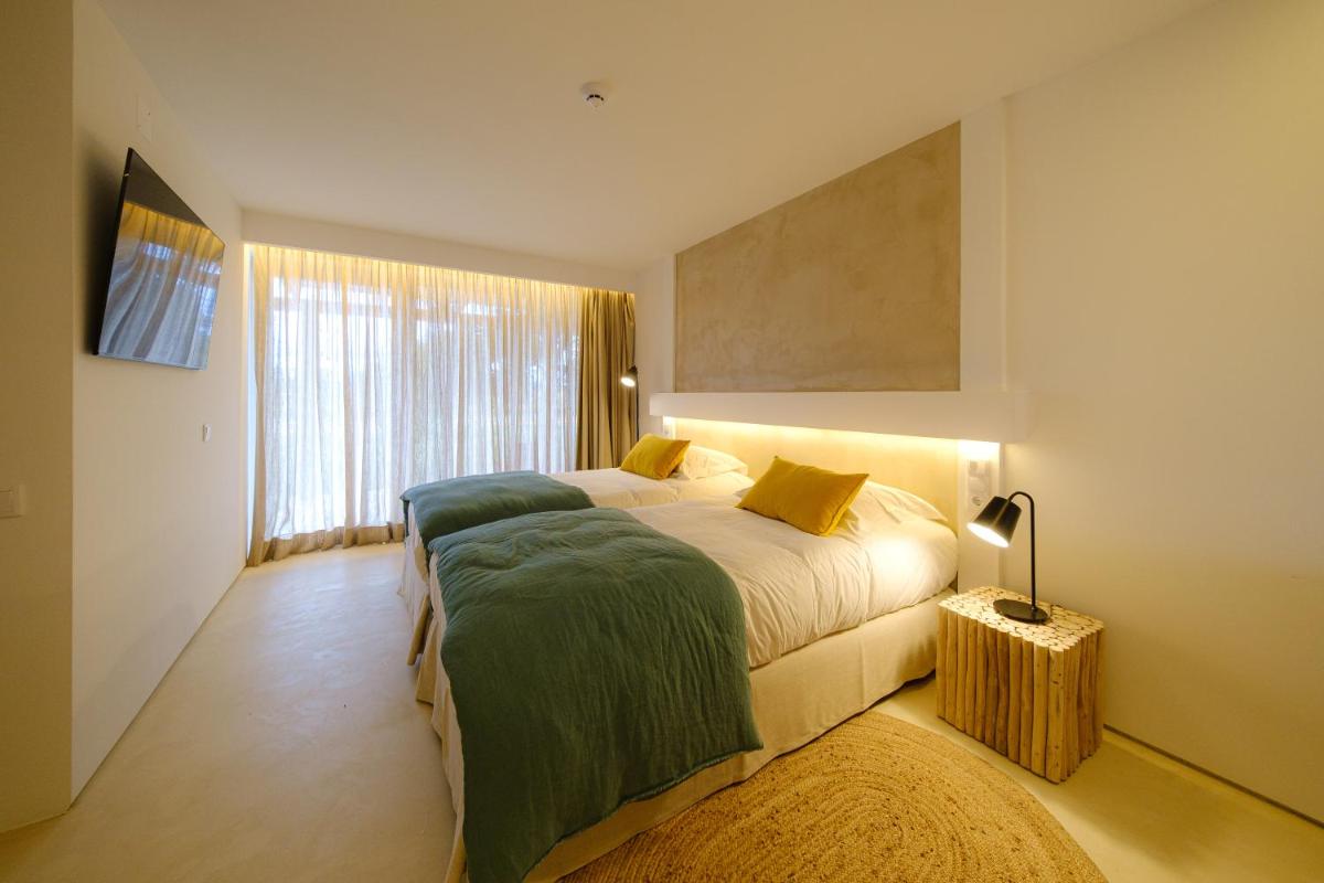 Uma cama ou camas num quarto em Sorraia Hotel Rural