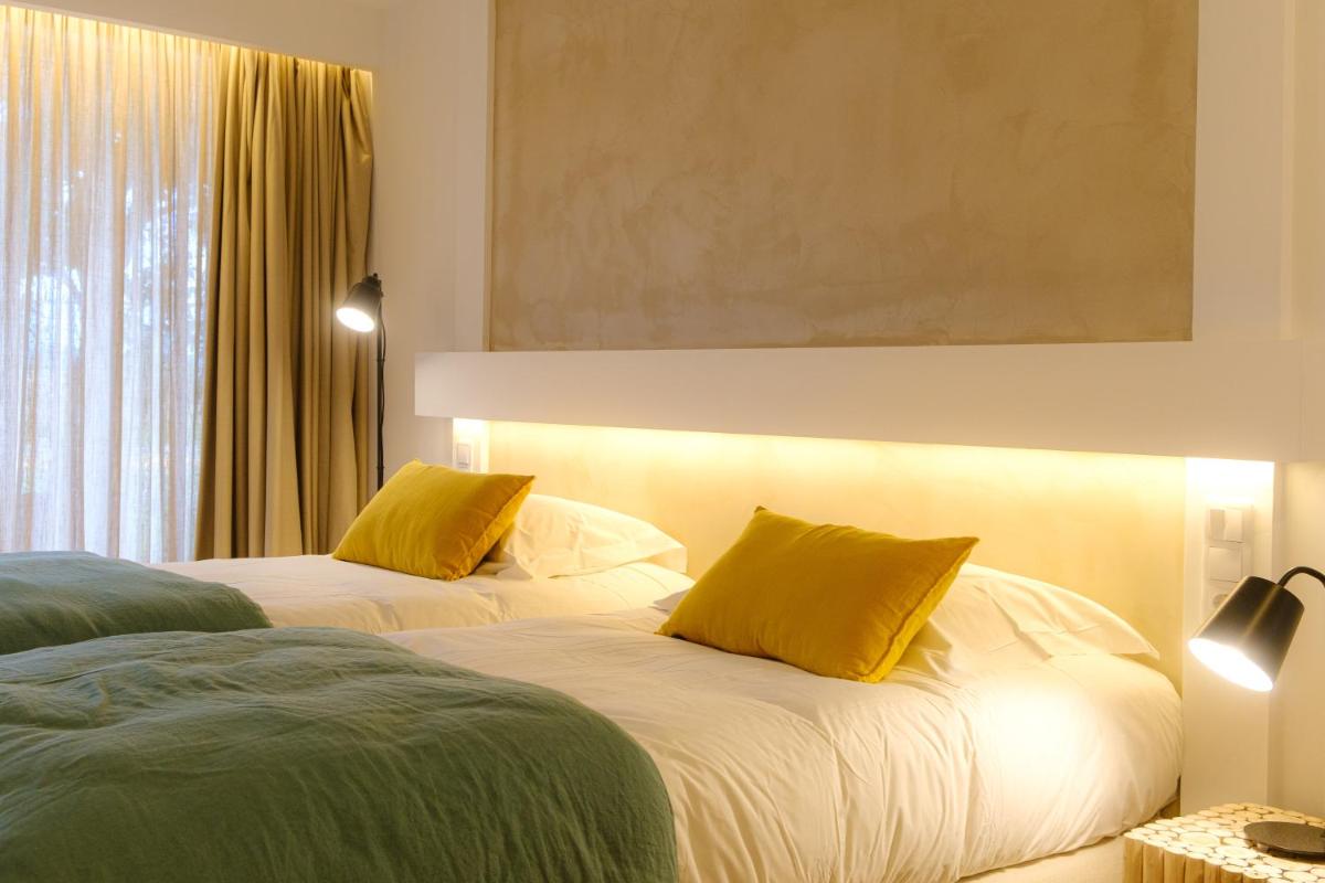 Uma cama ou camas num quarto em Sorraia Hotel Rural