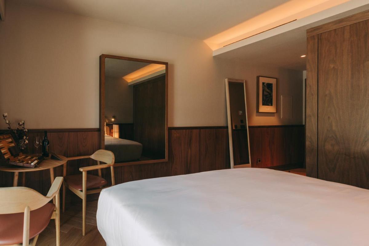 Uma cama ou camas num quarto em Torel Quinta da Vacaria - Douro Valley