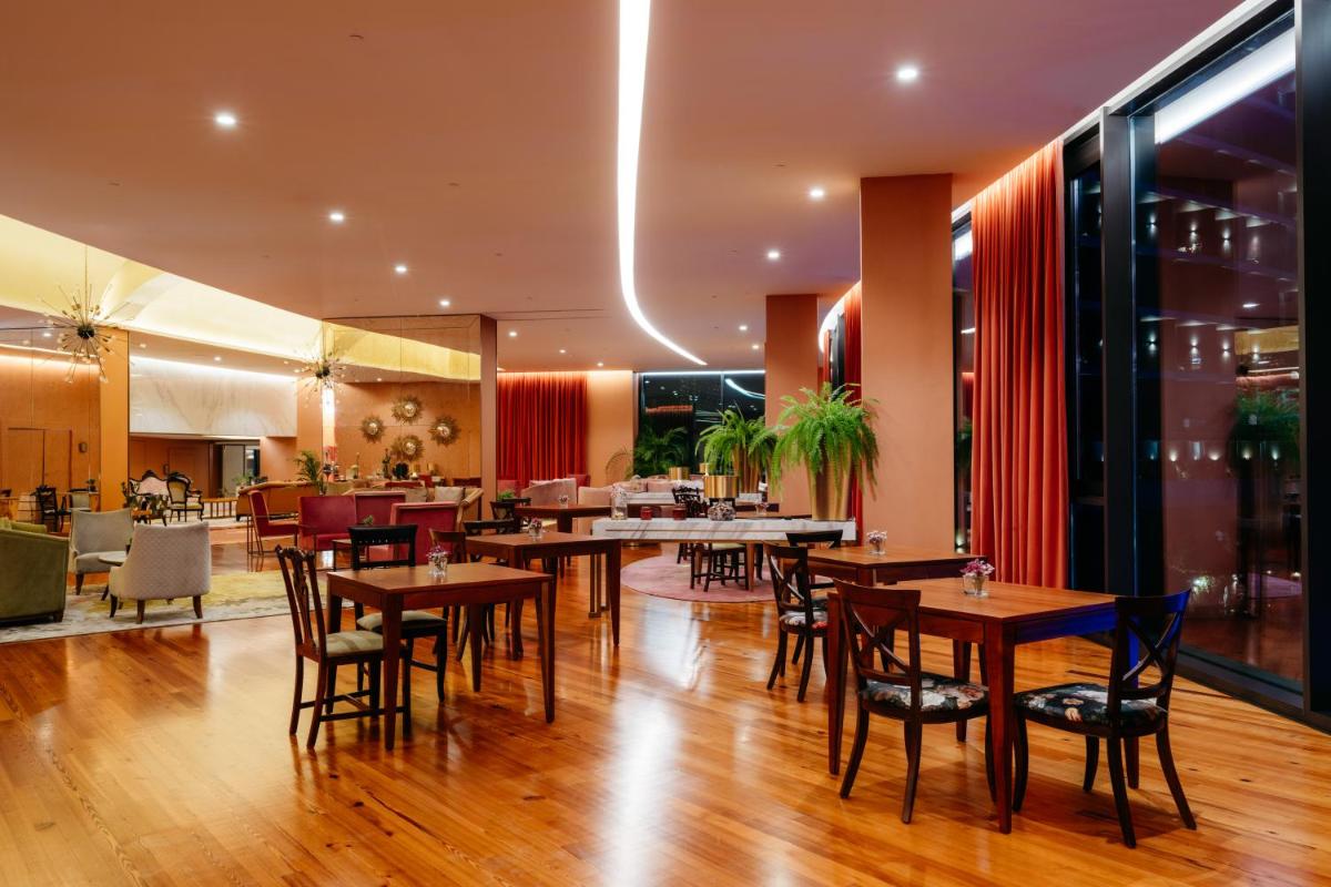 Um restaurante ou outro lugar para comer em Savoy Palace - The Leading Hotels of the World - Savoy Signature