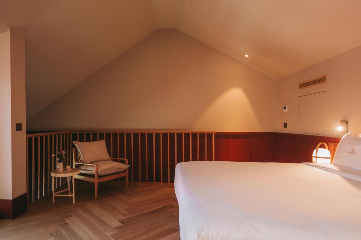 Uma cama ou camas num quarto em Torel Quinta da Vacaria - Douro Valley