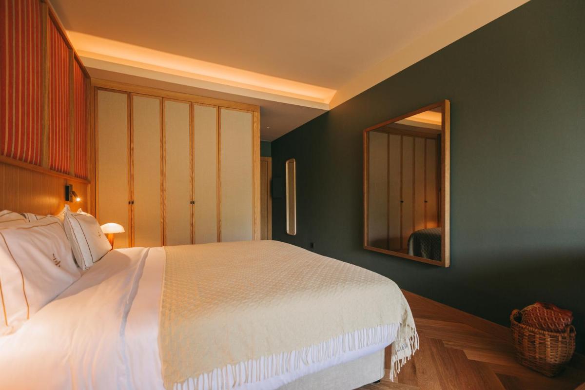 Uma cama ou camas num quarto em Torel Quinta da Vacaria - Douro Valley