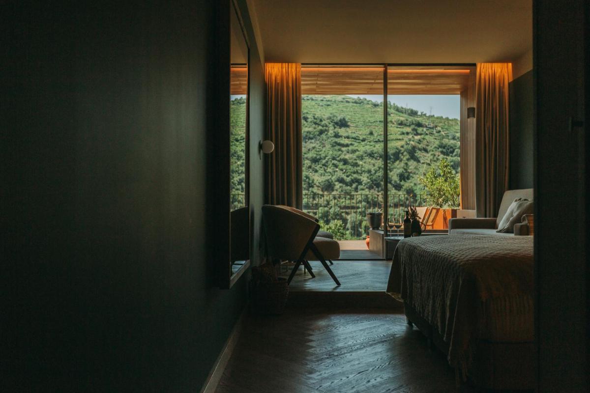 Uma cama ou camas num quarto em Torel Quinta da Vacaria - Douro Valley