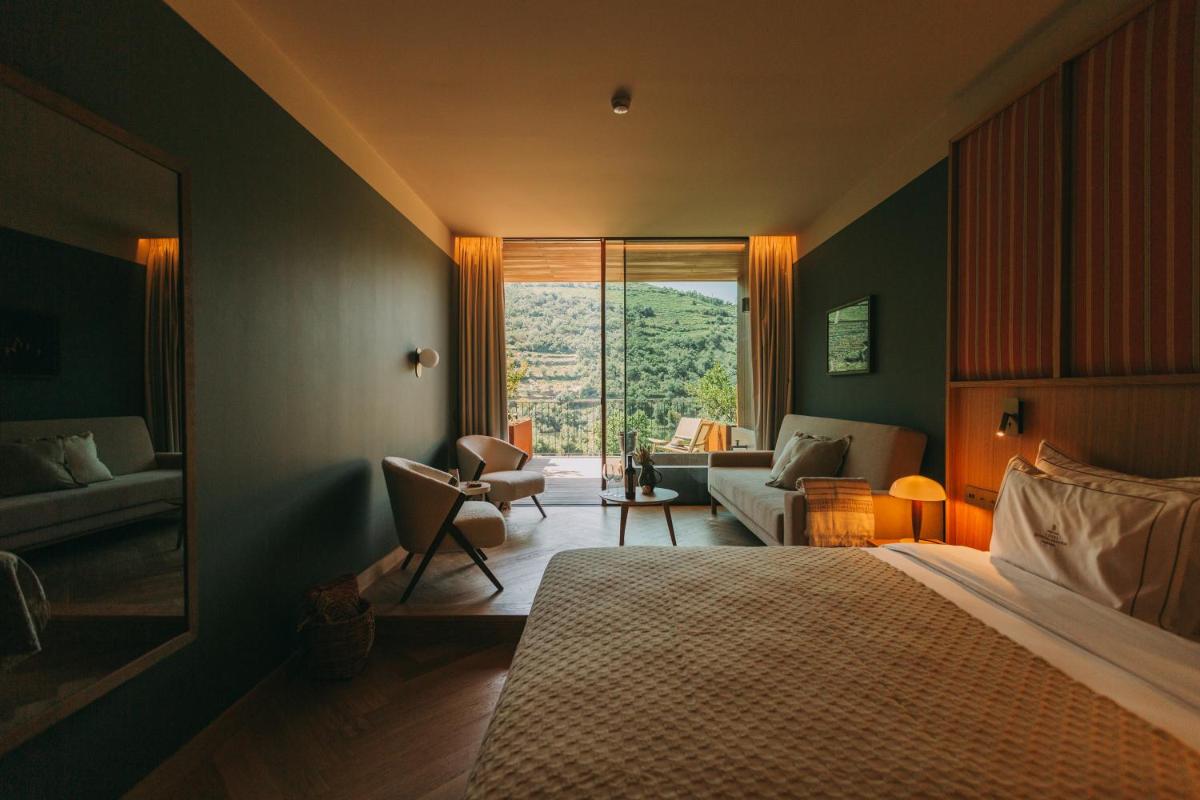 Uma cama ou camas num quarto em Torel Quinta da Vacaria - Douro Valley