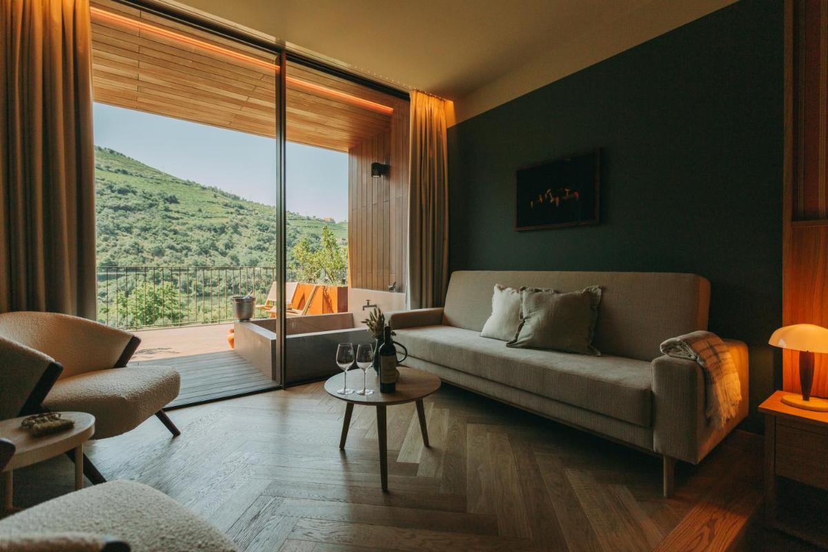 Uma área de estar em Torel Quinta da Vacaria - Douro Valley
