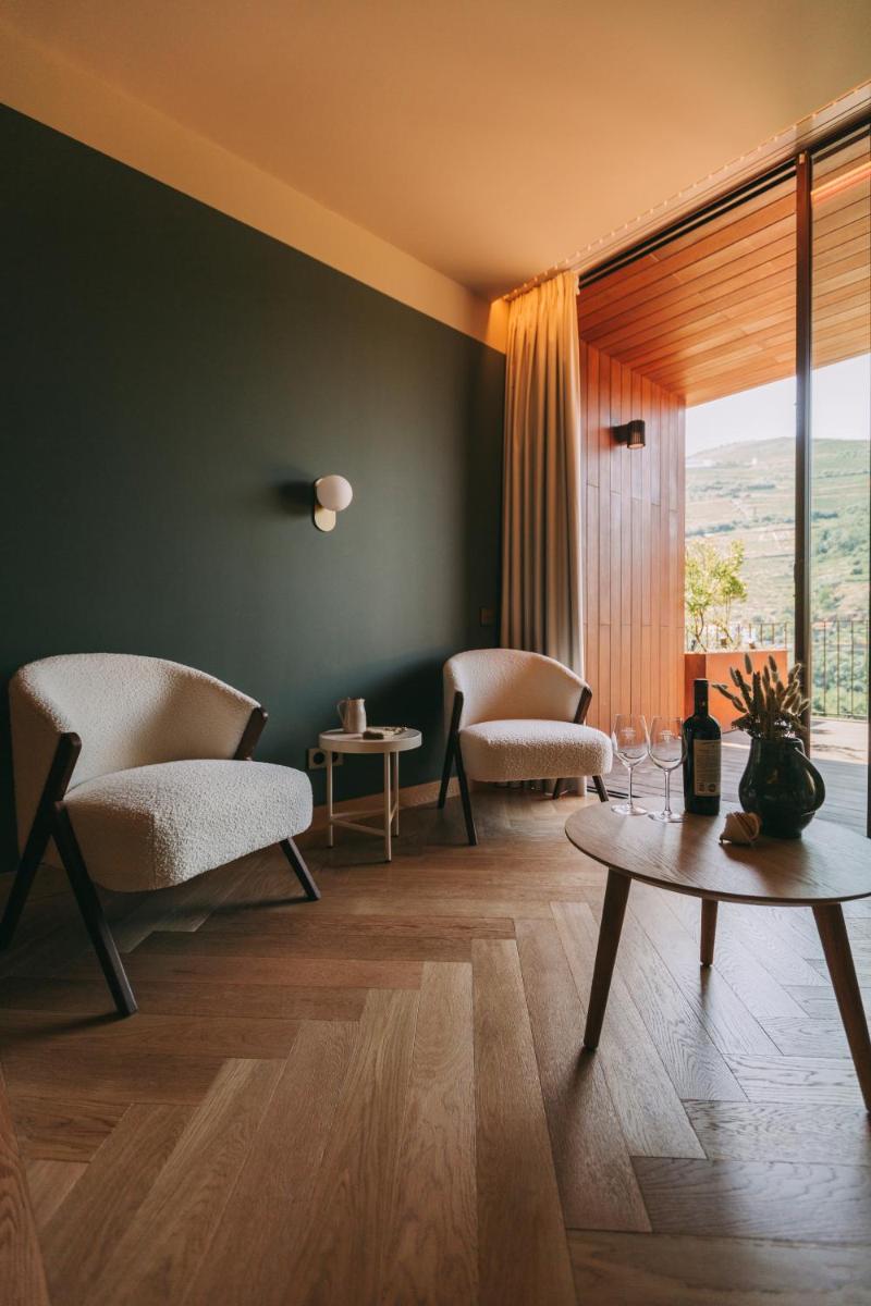 Uma área de estar em Torel Quinta da Vacaria - Douro Valley