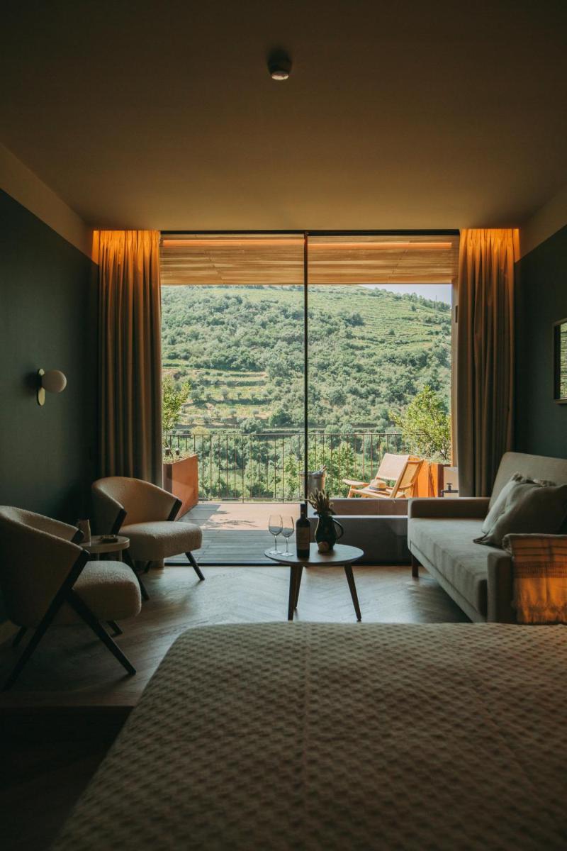 Uma cama ou camas num quarto em Torel Quinta da Vacaria - Douro Valley