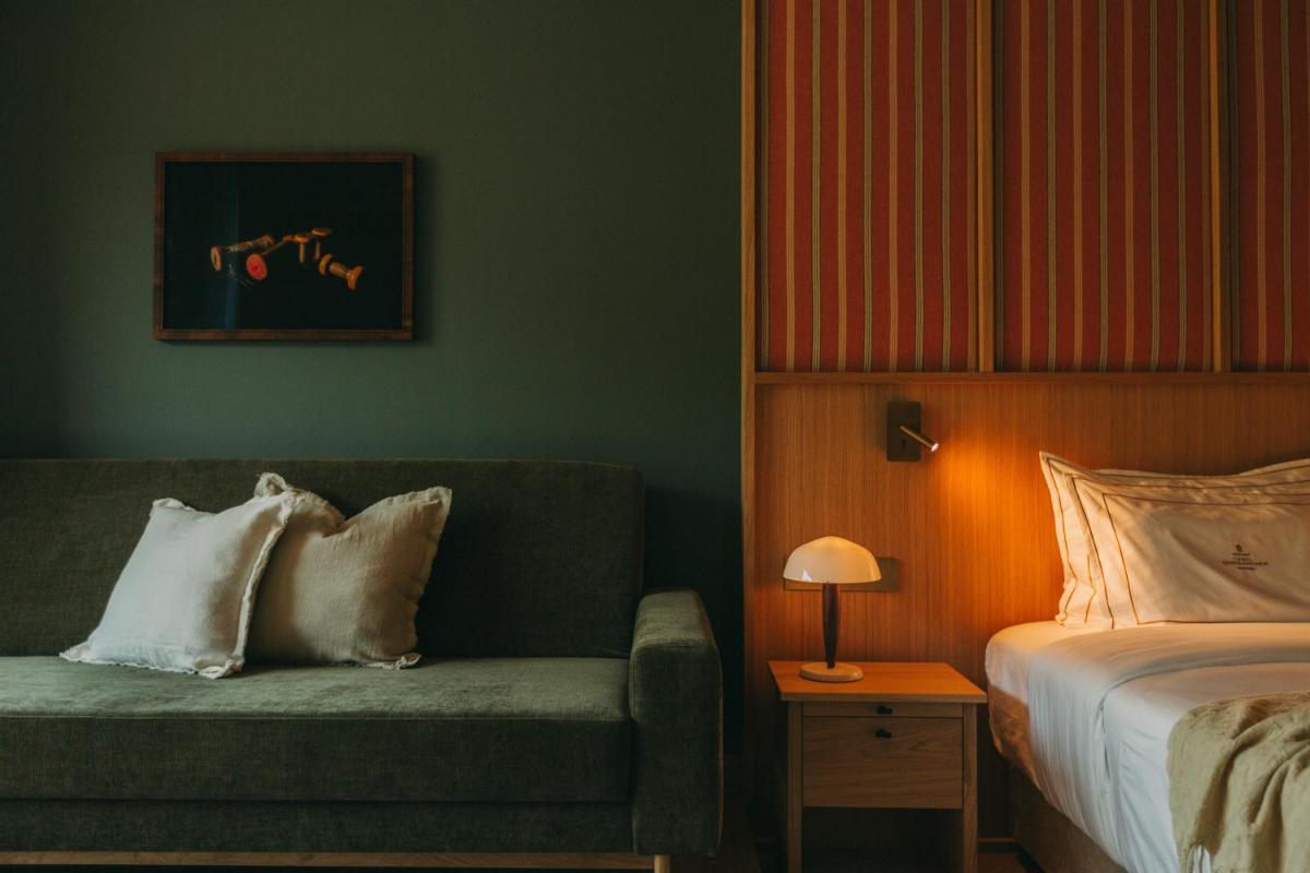 Uma cama ou camas num quarto em Torel Quinta da Vacaria - Douro Valley