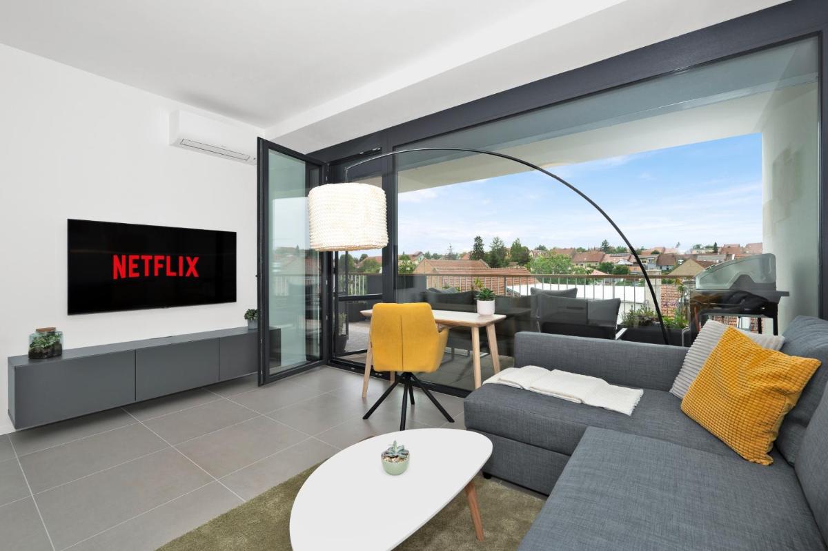 Fully equipped Apartments with Terraces, Free garage parking, Netflix & AC - by Apartmány Šlapanice cz - Housity