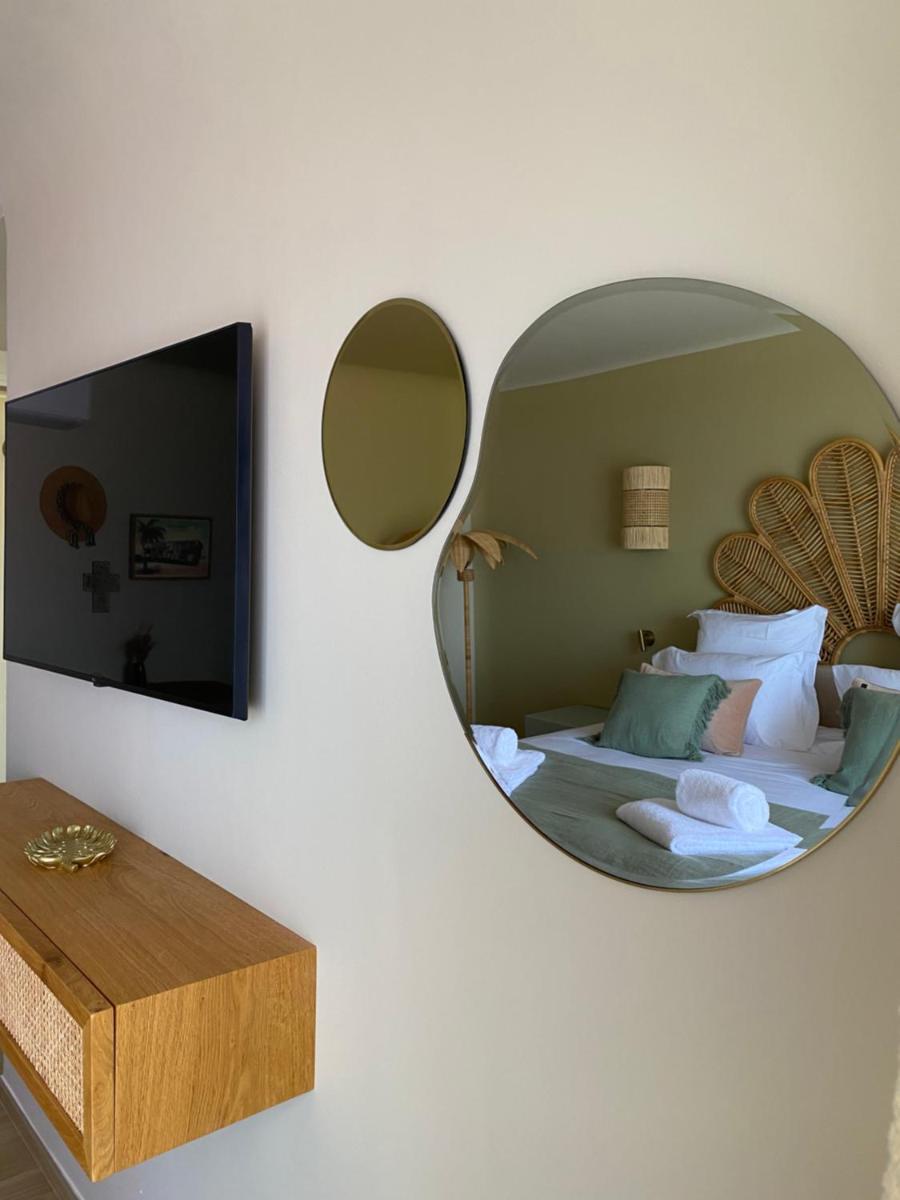 Télévision ou salle de divertissement dans l'établissement Hotel Riva Beach