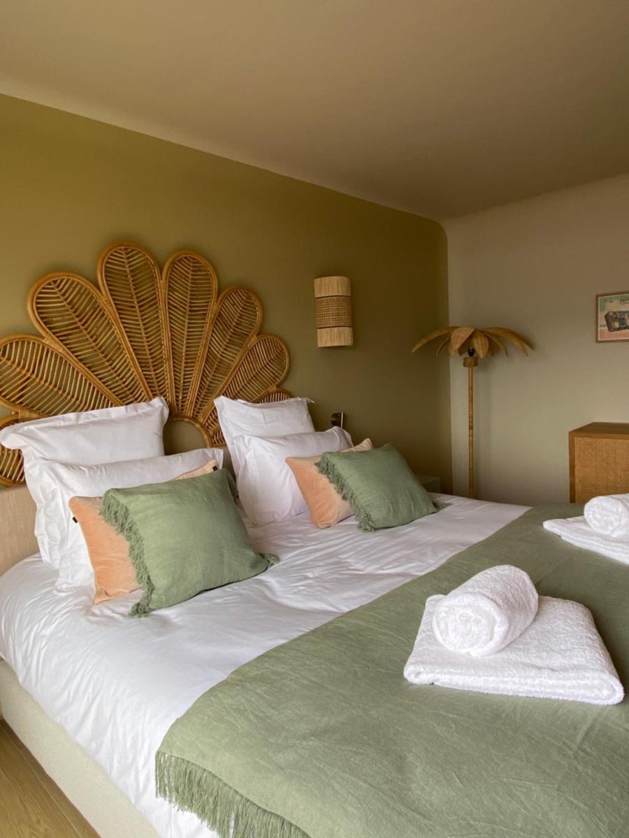 Un ou plusieurs lits dans un hébergement de l'établissement Hotel Riva Beach