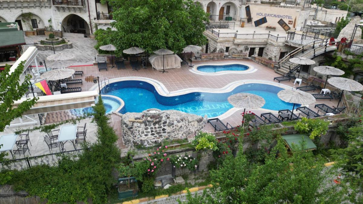 Holiday Cave Hotel - Housity