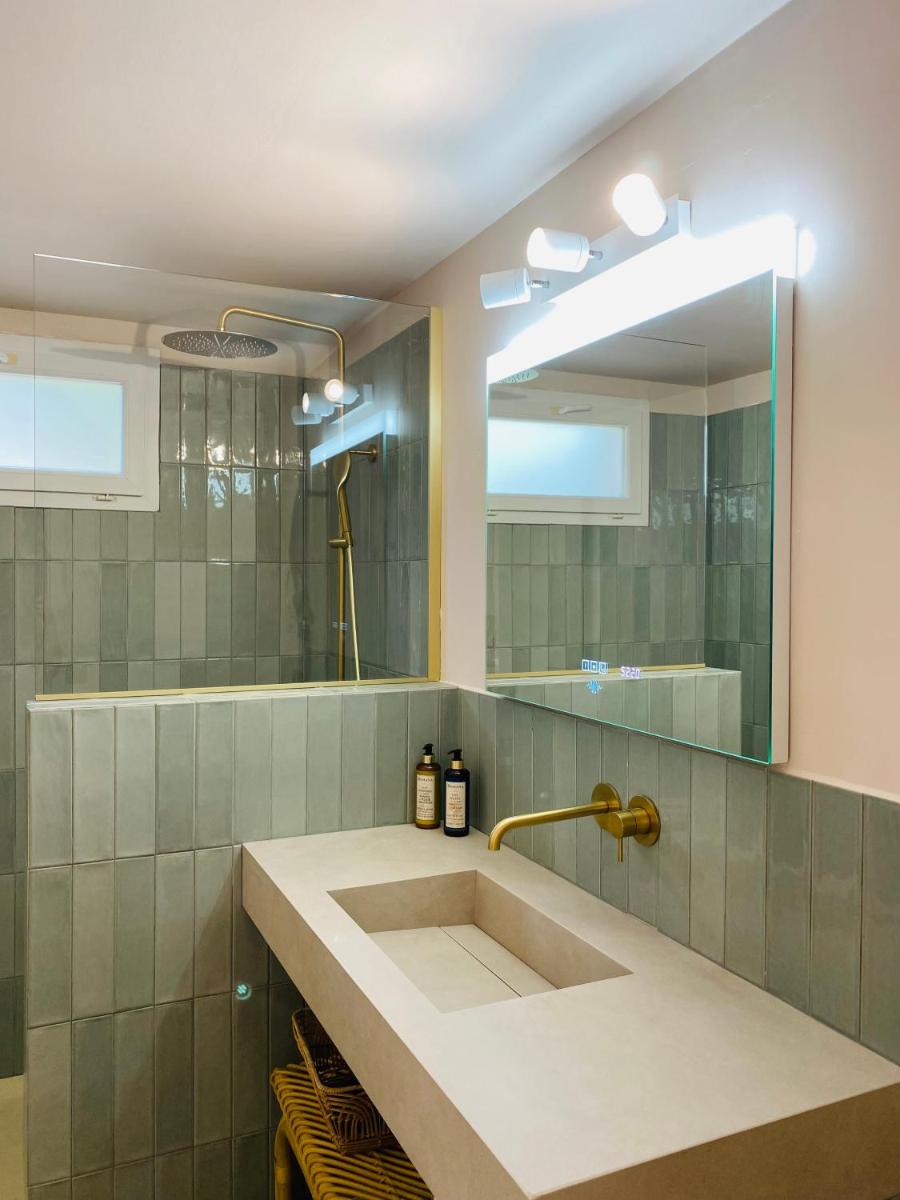 Salle de bains dans l'établissement Hotel Riva Beach