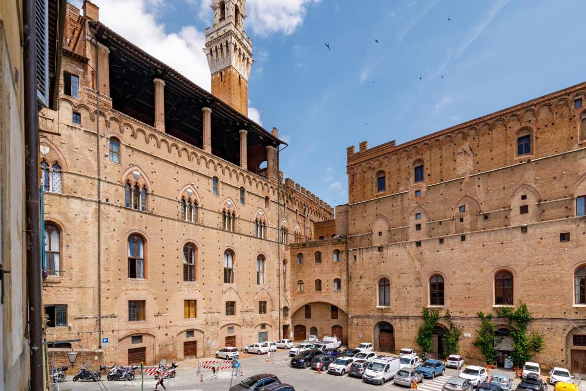 GuestHost - Charme in the Historic Centre of SIena - Hizvo