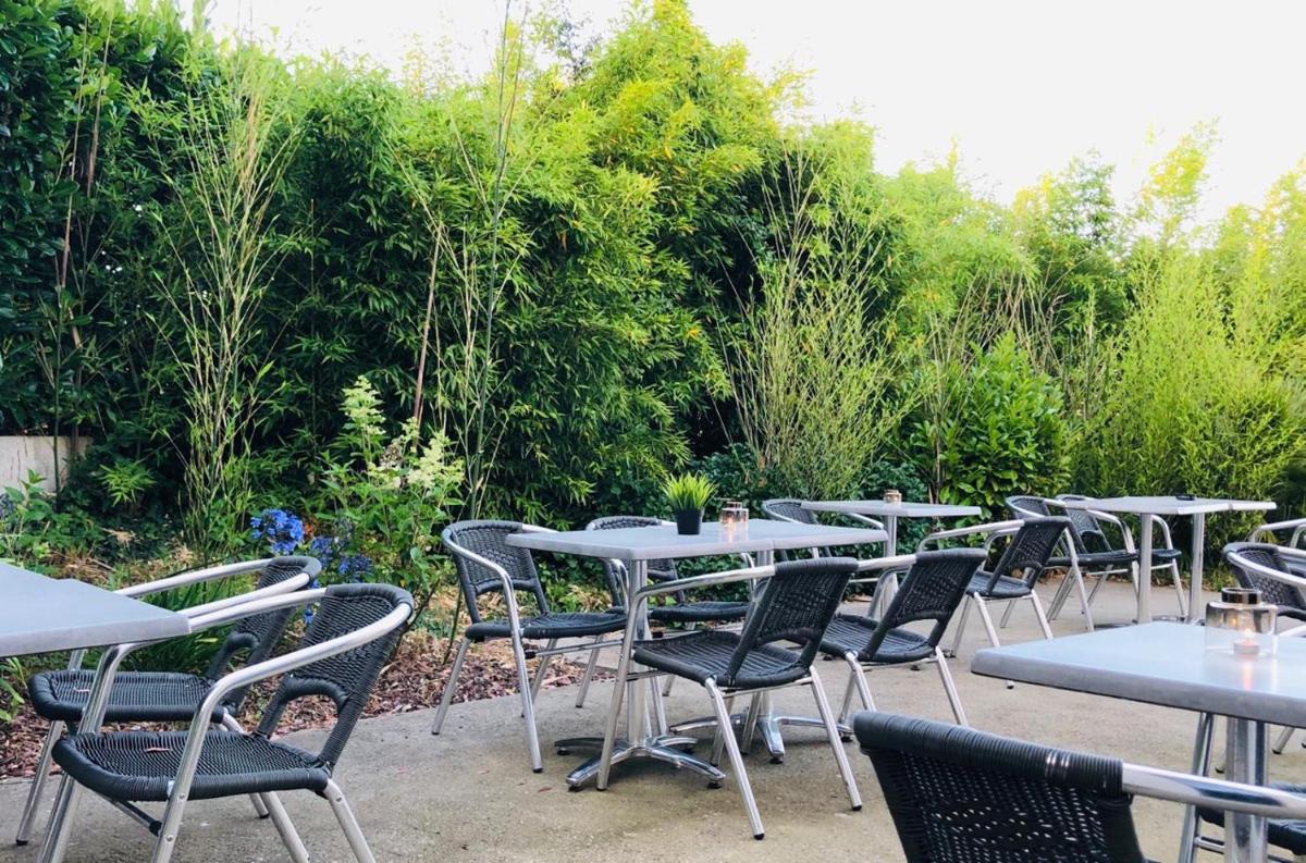 Jardin de l'établissement Brit Hotel Le Galion & Spa
