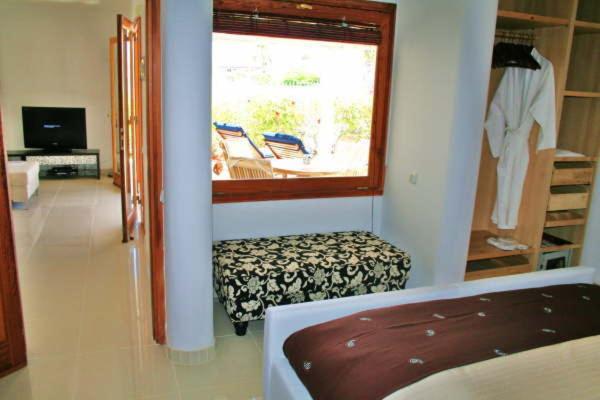 Cama o camas de una habitación en Birdcage Gay Men Resort and Lifestyle Hotel