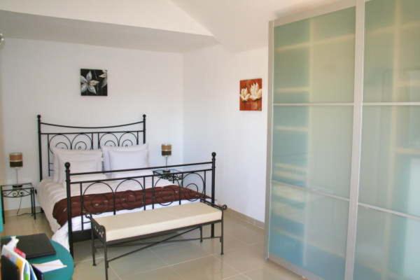 Cama o camas de una habitación en Birdcage Gay Men Resort and Lifestyle Hotel